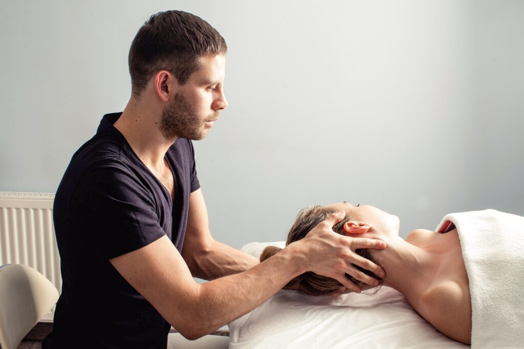 A male RMT provides a therapeutic massage.