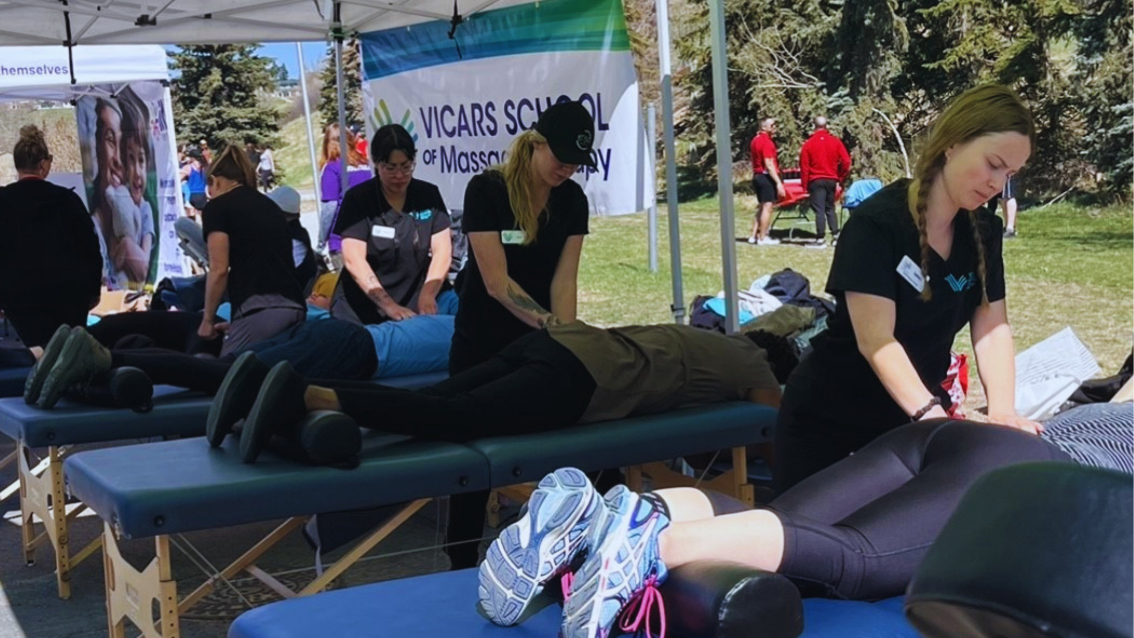 Vicars students providing massages at our Giving Clinic