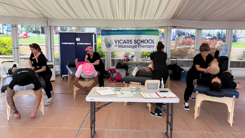 Vicars student provide on-site massages at the 2026 FireFit challenge in Calgary.