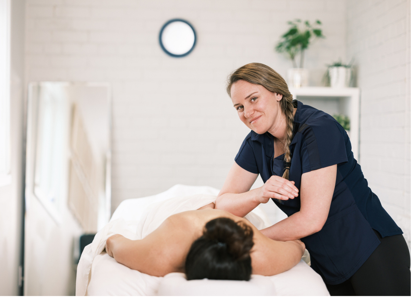 A student RMT provides a massage