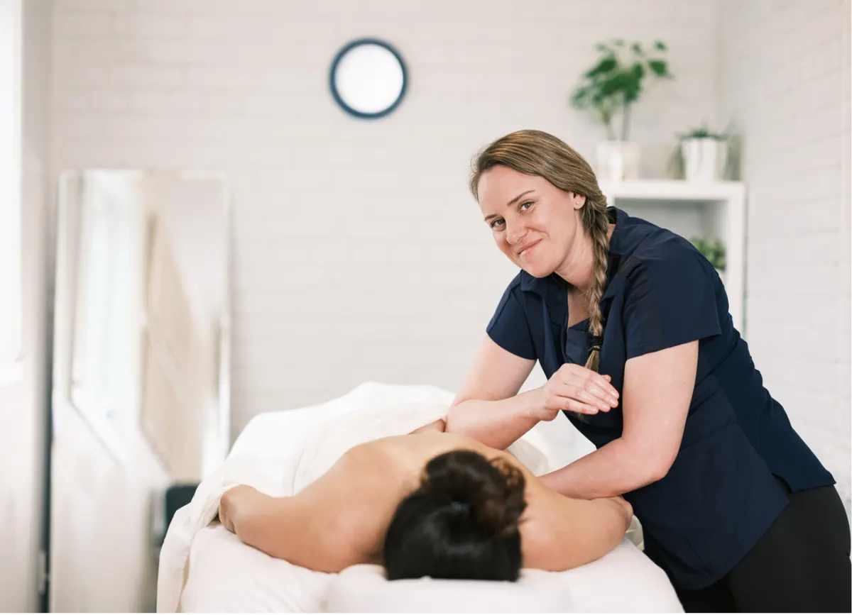 A student RMT provides a massage